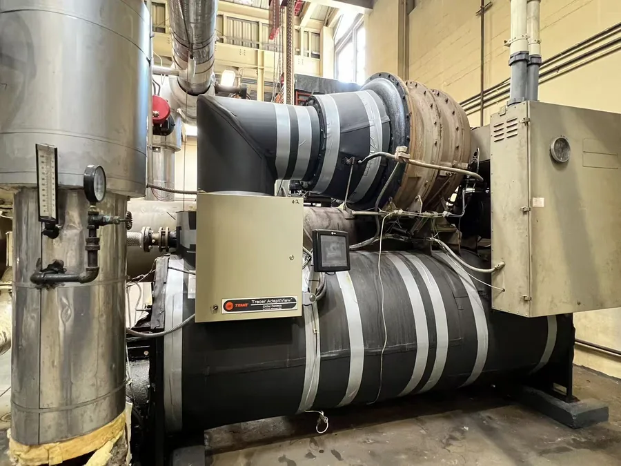 Centrifugal chiller control panel checked during scheduled service in New York City