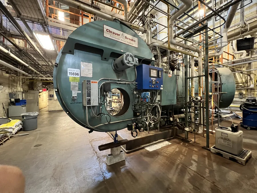 Cleaver-Brooks firetube boiler in a NYC commercial boiler room during scheduled service